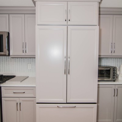 full kitchen remodel with hidden fridge