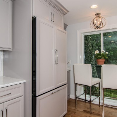 Full kitchen remodel with cabinets and fridge