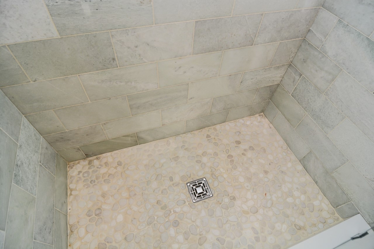 Hamilton Bathroom Remodel with shower stone flooring