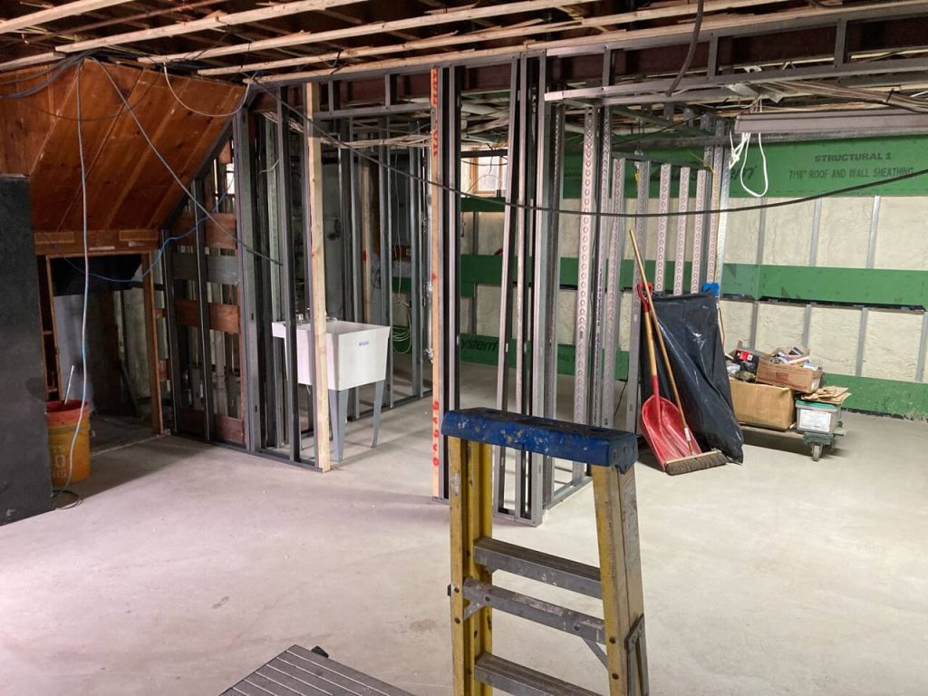 Basement Remodel Framing for laundry area with furring strips